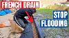 How To Stop Flooding With A French Drain Diy